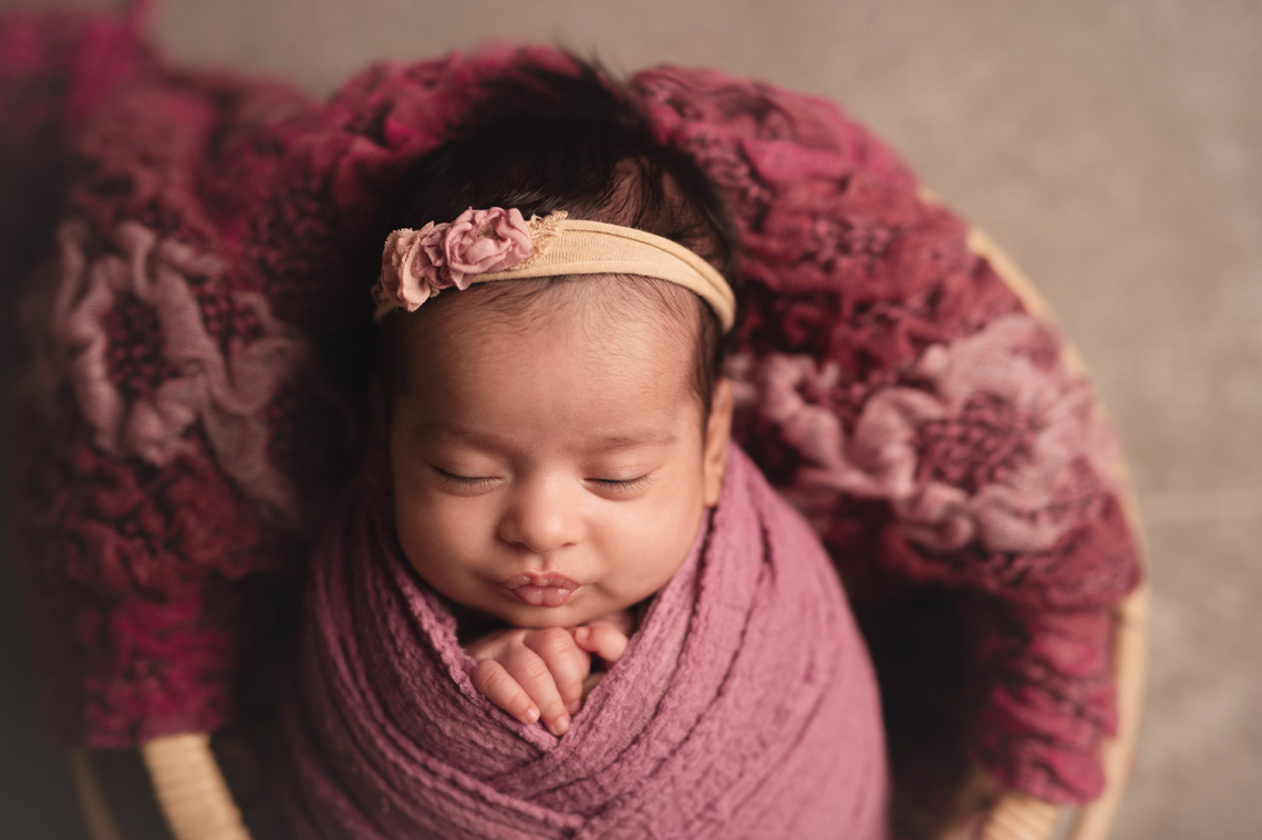 indian newborn baby girl in the basket