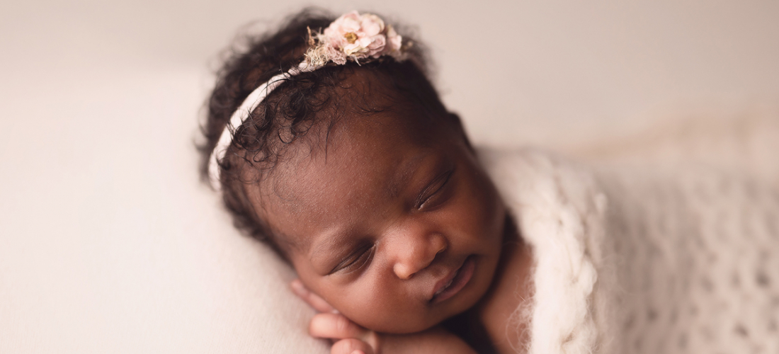 Beautiful  afro newborn session in Surrey